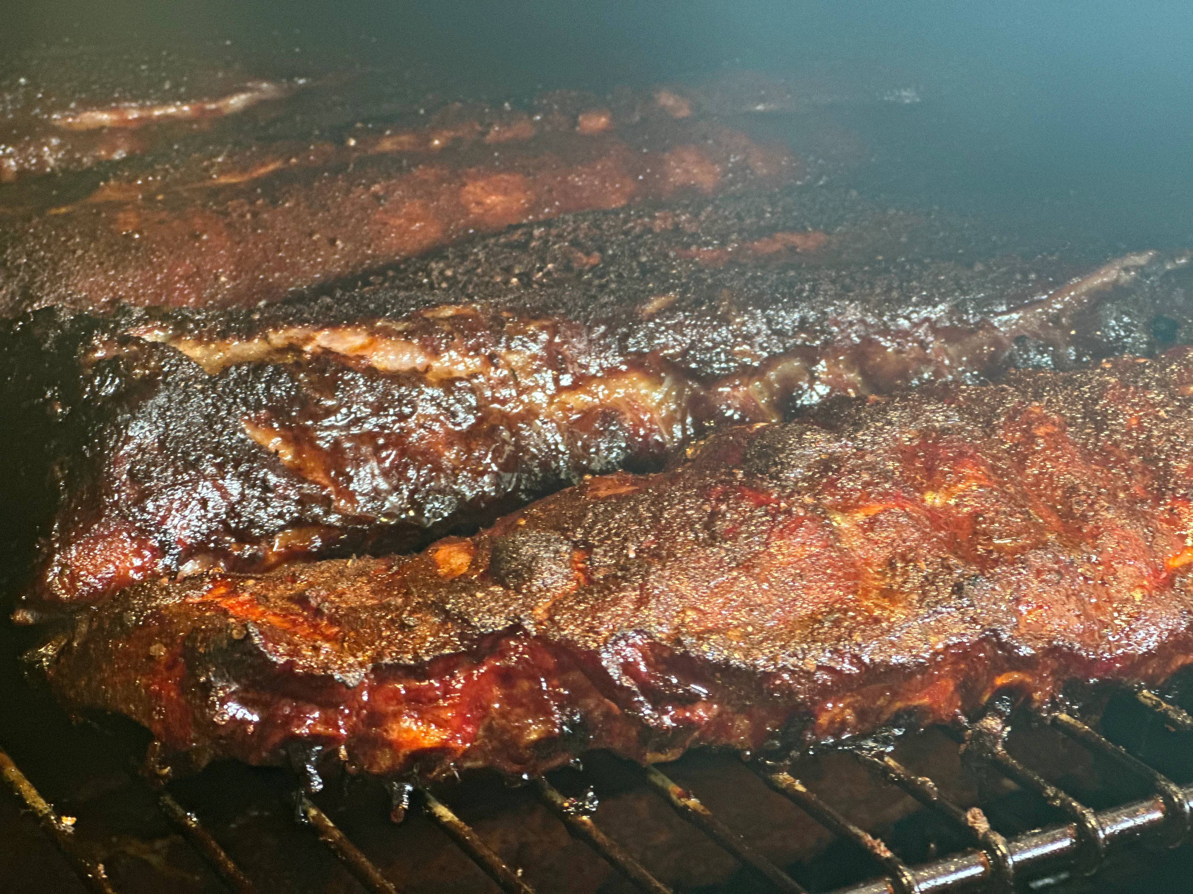 Slow smoked ribs coated in signature glaze