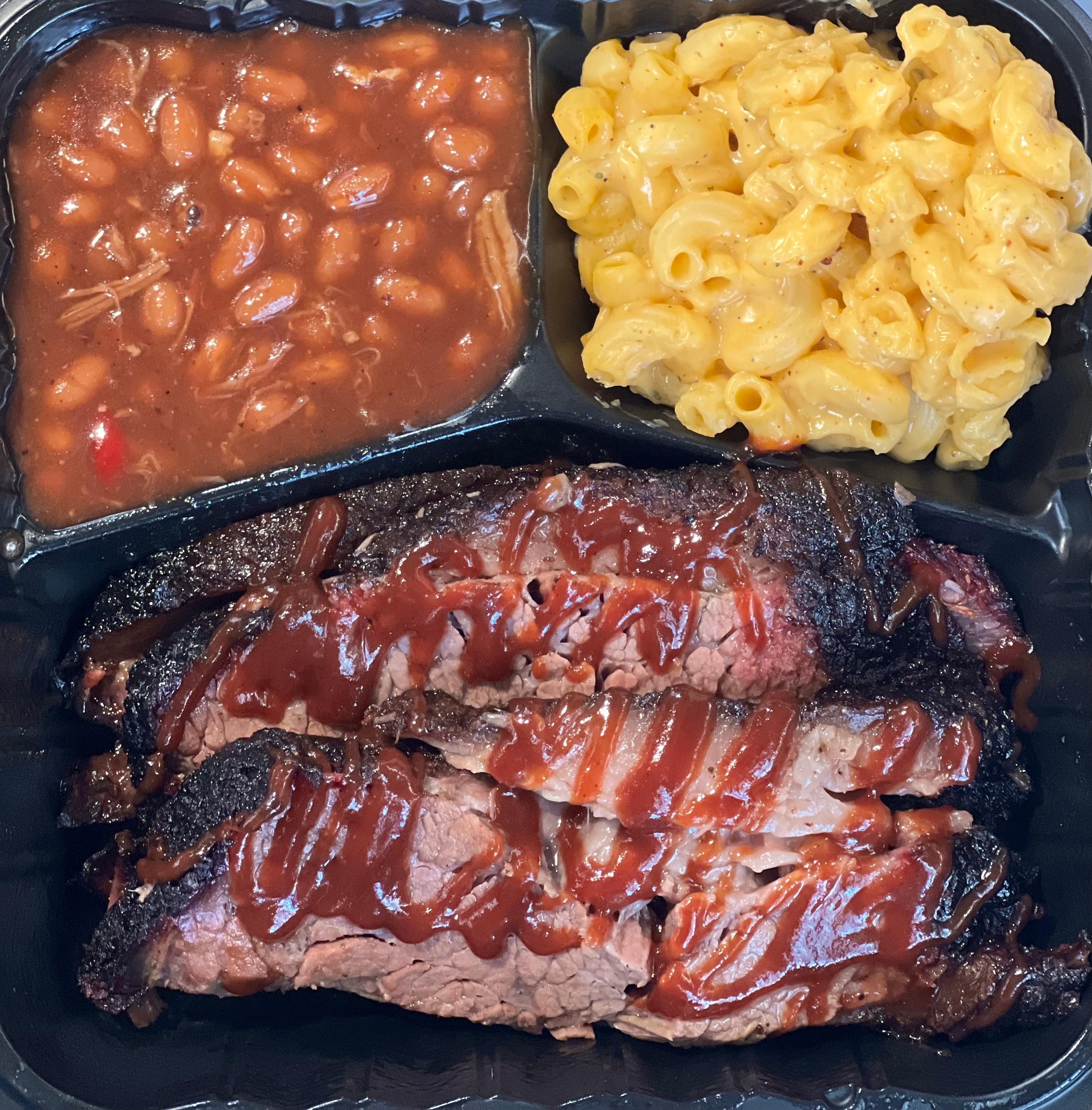 Two thick slices of dry rubbed brisket platter